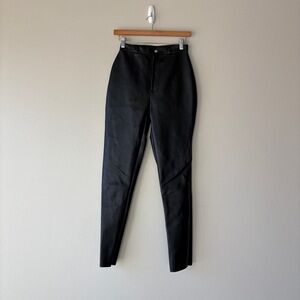 prettylittlething noir faux leather hip shaped pants